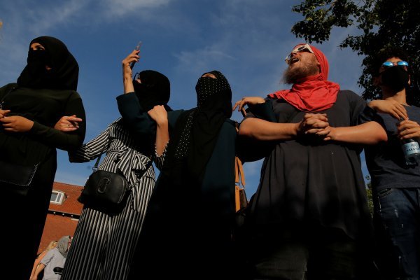 Denmark ’s burqa ban met with protests