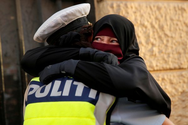 Denmark ’s burqa ban met with protests