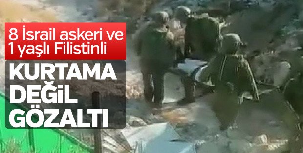 İsrail askerleri yaşlı Filistinliyi sedyede gözaltına aldı