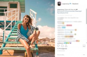 Özge Ulusoy, turkuaz mayosuyla yaza veda etti