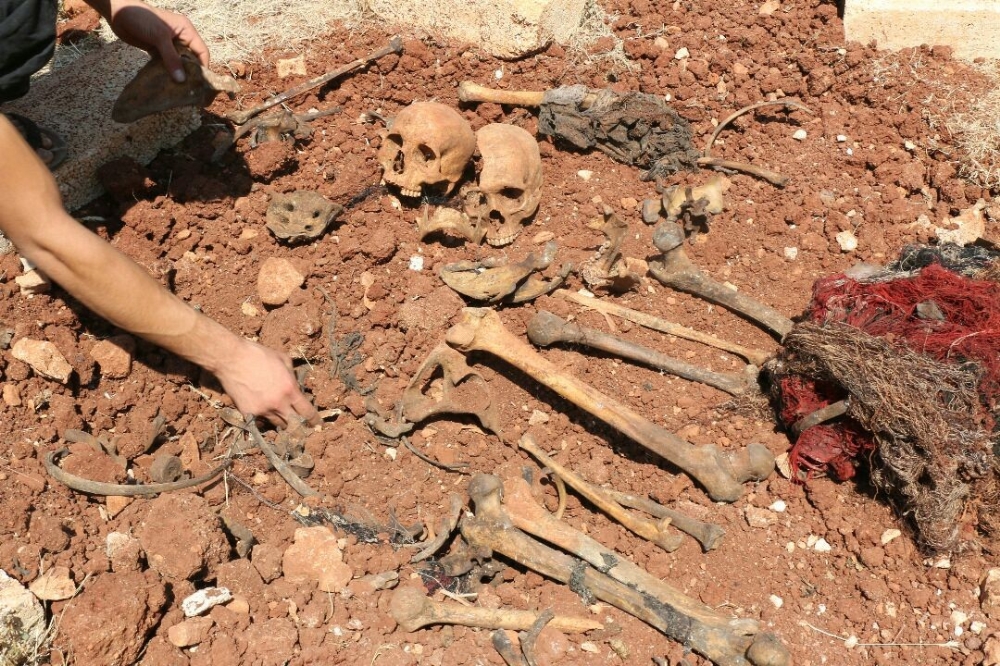 Esad'ın kimyasal katliamı: Halep ’te toplu mezar bulundu