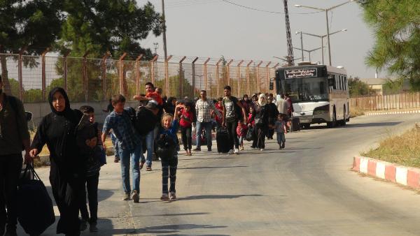 Bayramı ülkelerinde geçiren 3 bin Suriyeli döndü